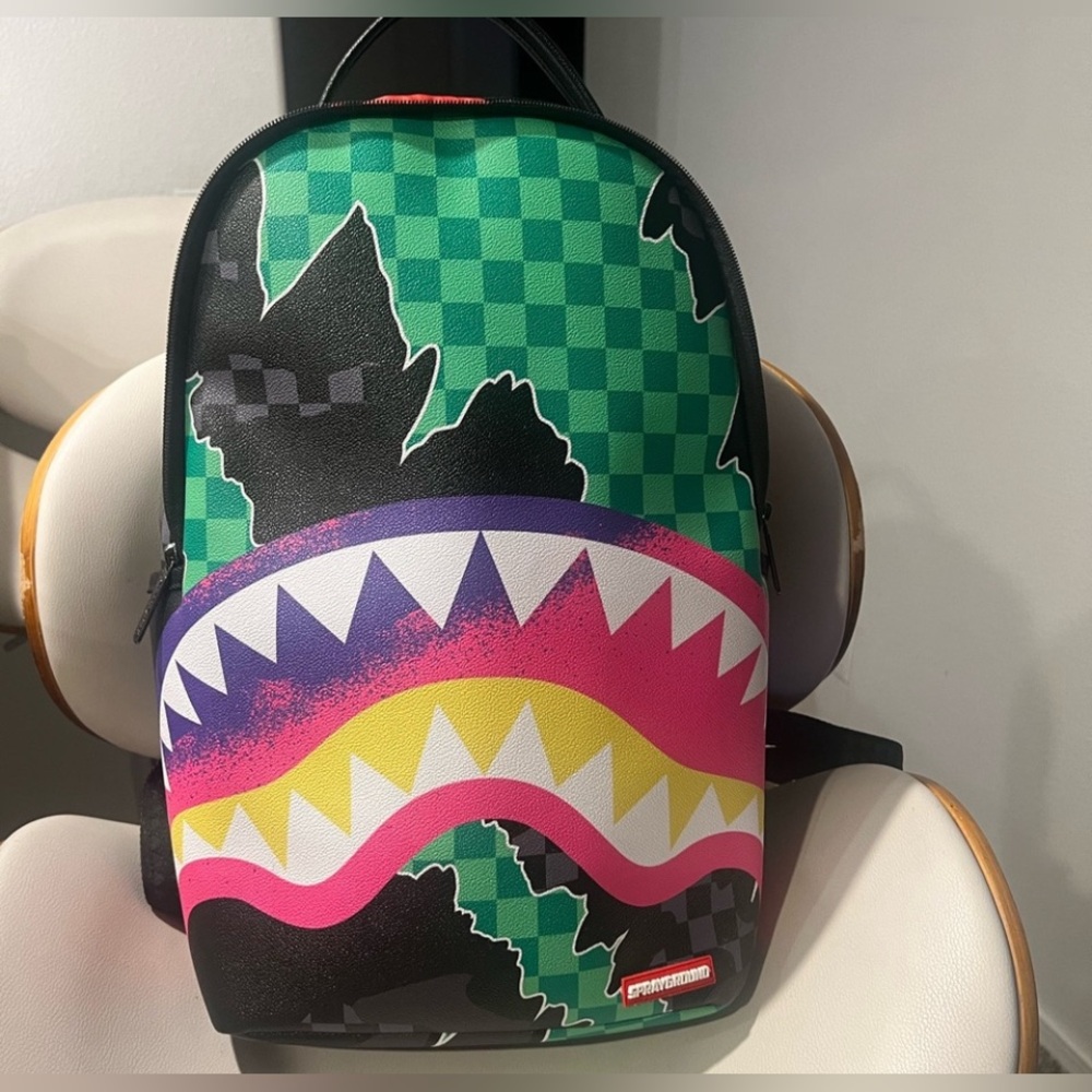 Sprayground Green and Pink Shark Backpack